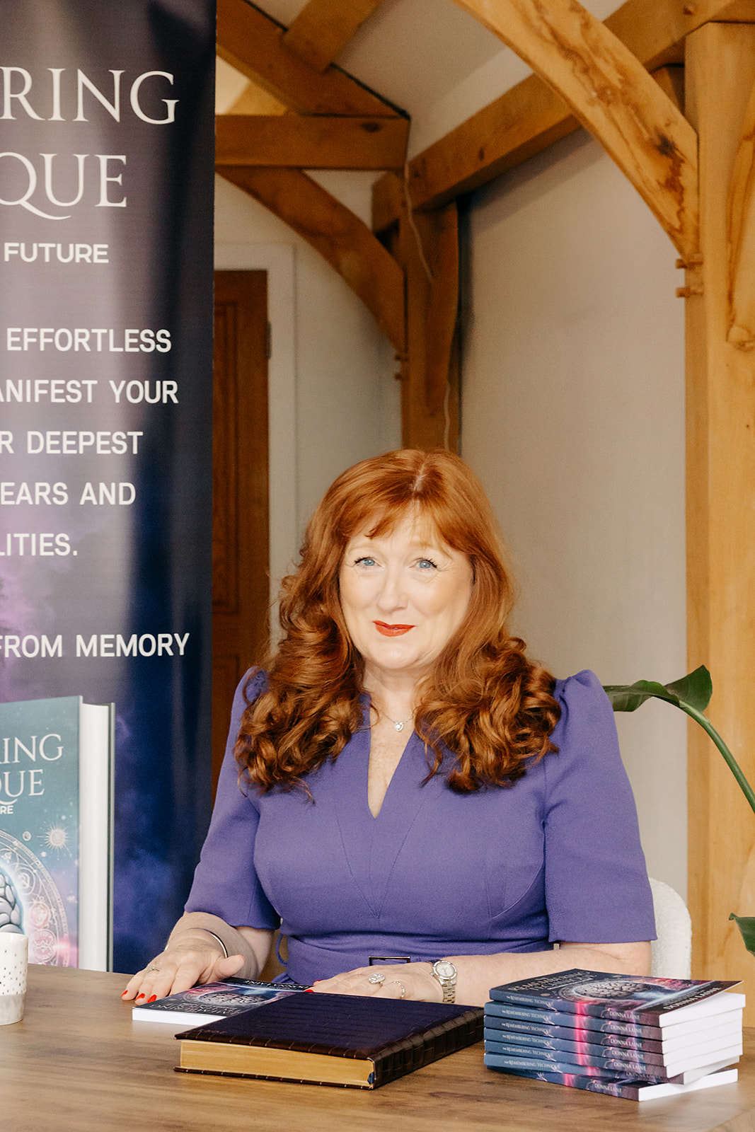 Donna Laine speaking with The Remembering Technique banner